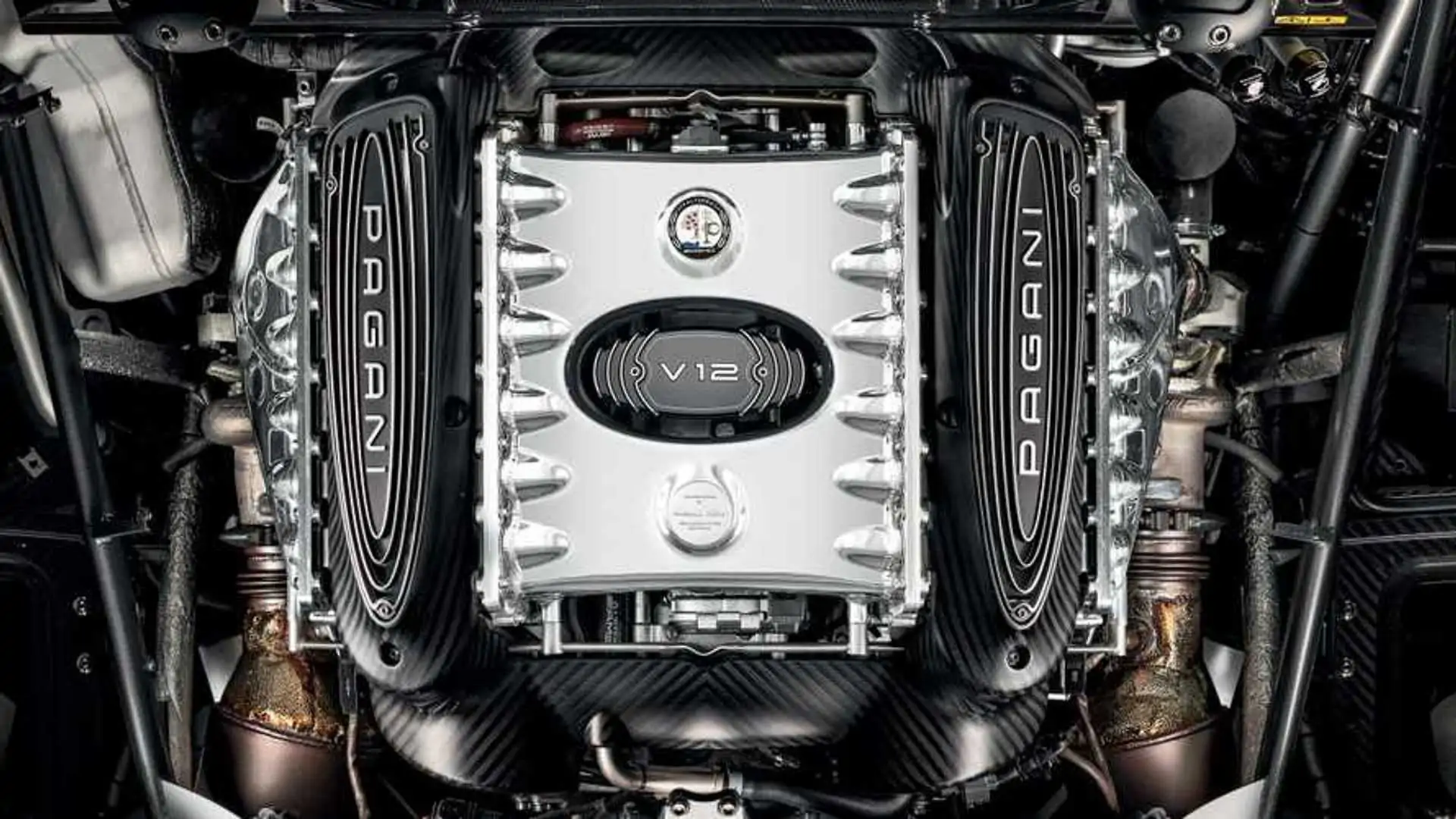 Pagani V12 engine with branded covers and carbon-fibre surround
